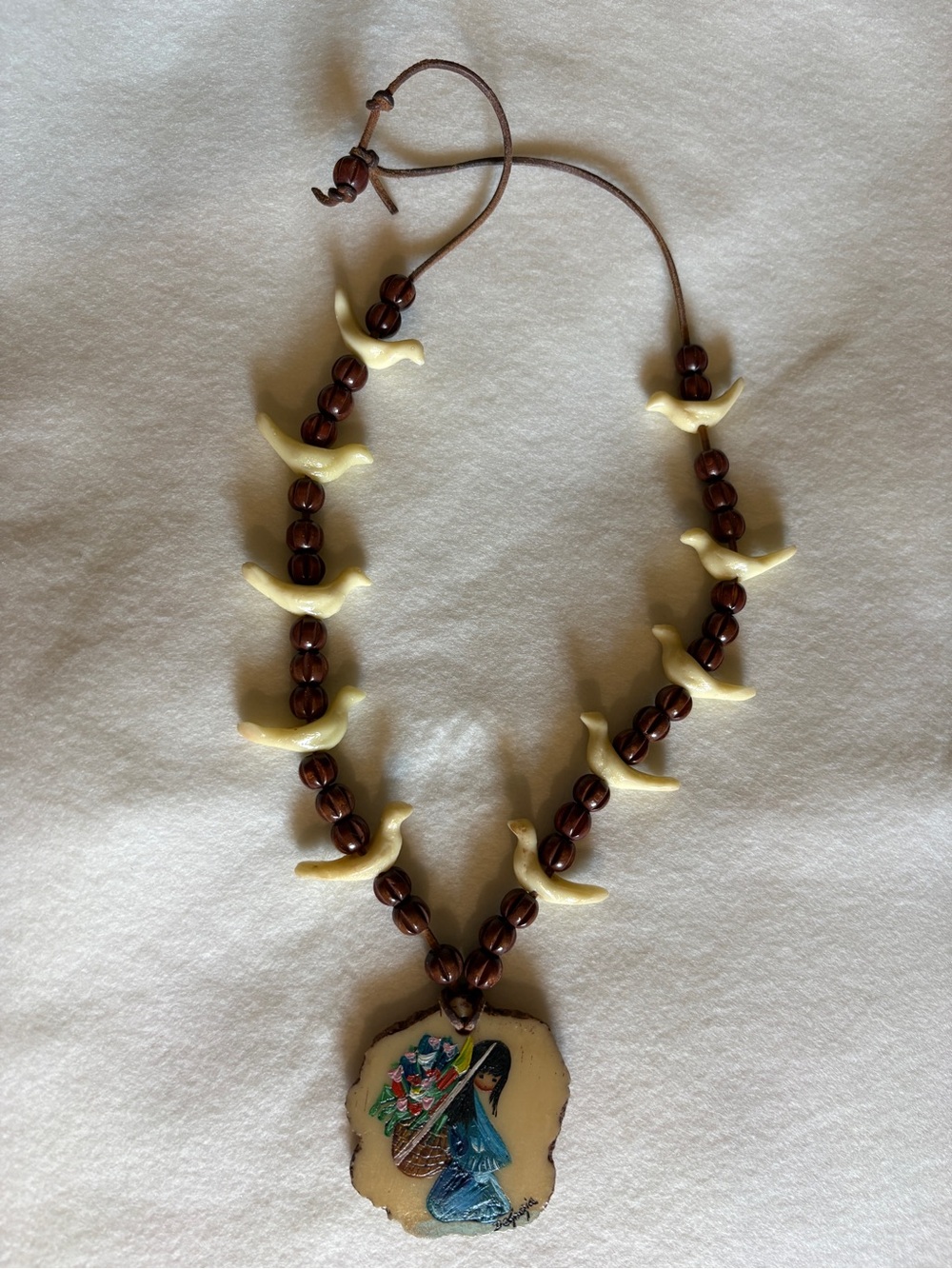 Handcrafted Brown and Cream Beaded Necklace with DeGrazia Painted Pendant